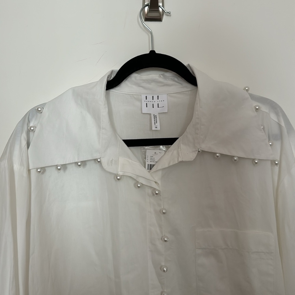 Crisp white button up with pearl detail
